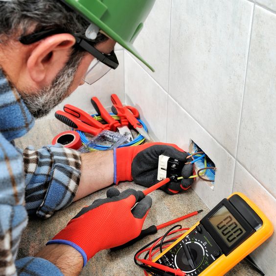 Skilled technician installing electrical meters Melbourne